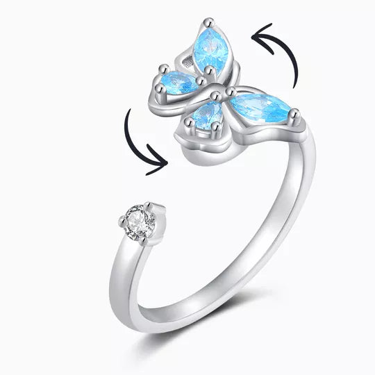Adjustable rotating butterfly ring