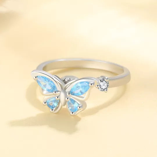 Adjustable rotating butterfly ring