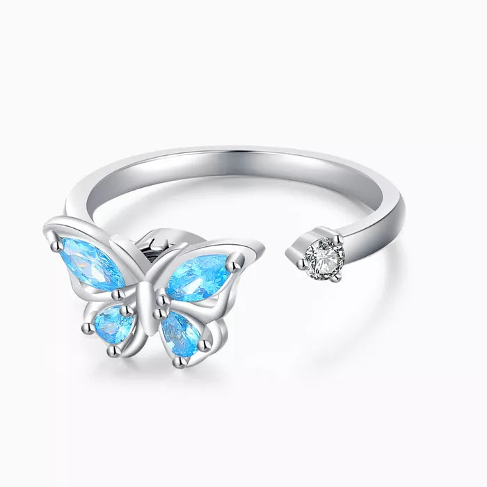 Adjustable rotating butterfly ring