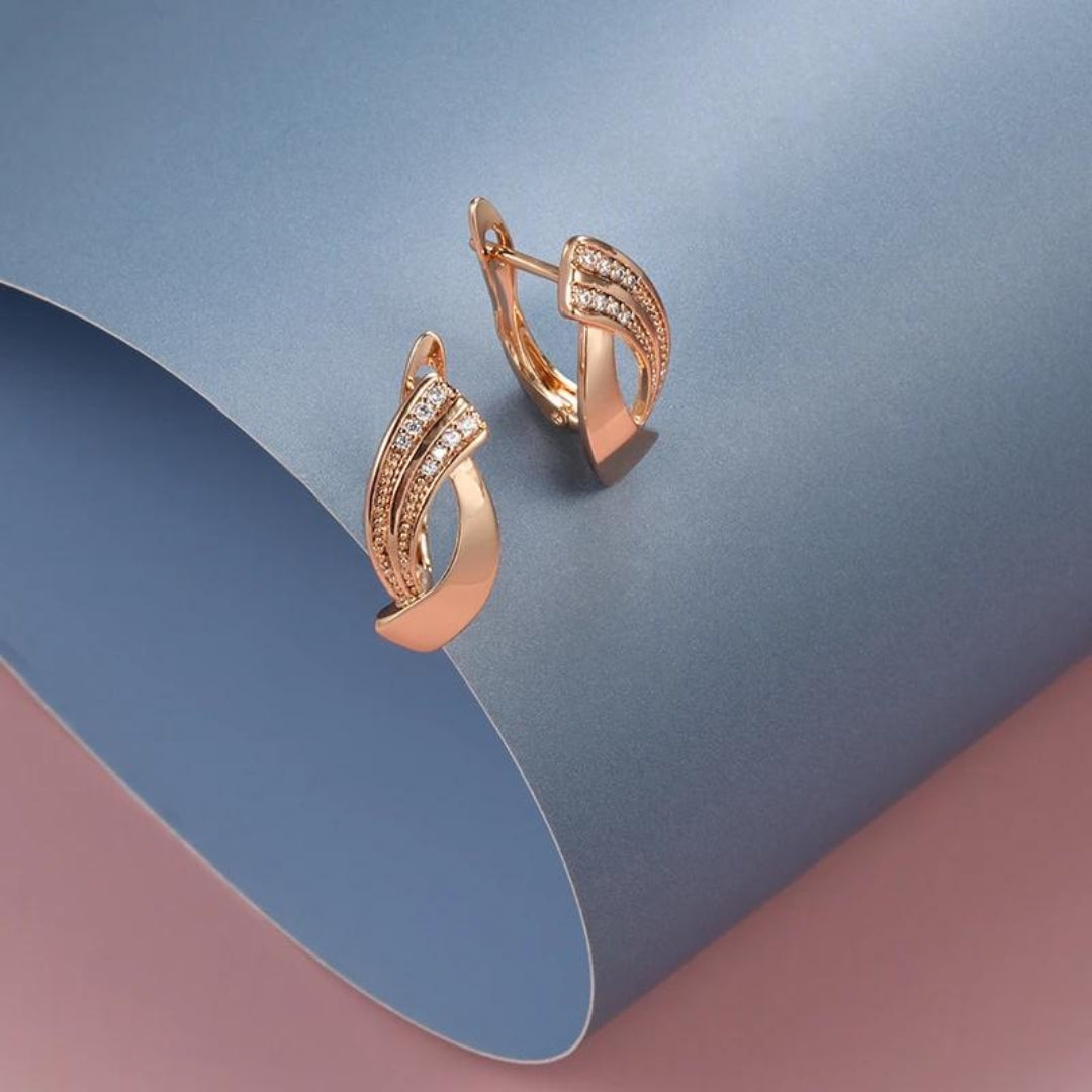 Elegant earrings with pink zircons