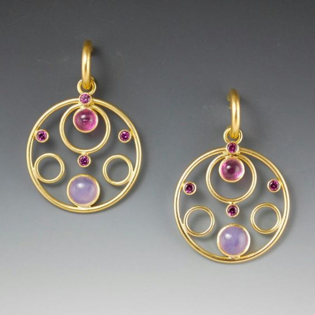 Earrings with purple crystals