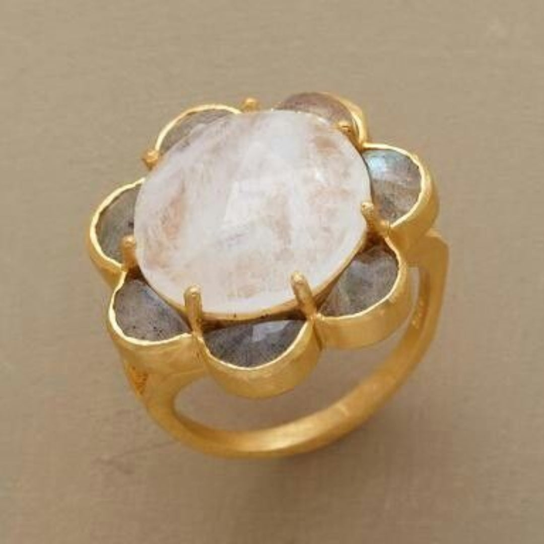 Ring with white crystal