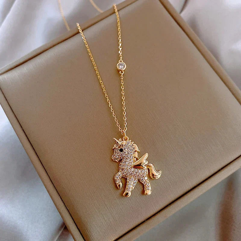 Gold unicorn necklace with zirconia