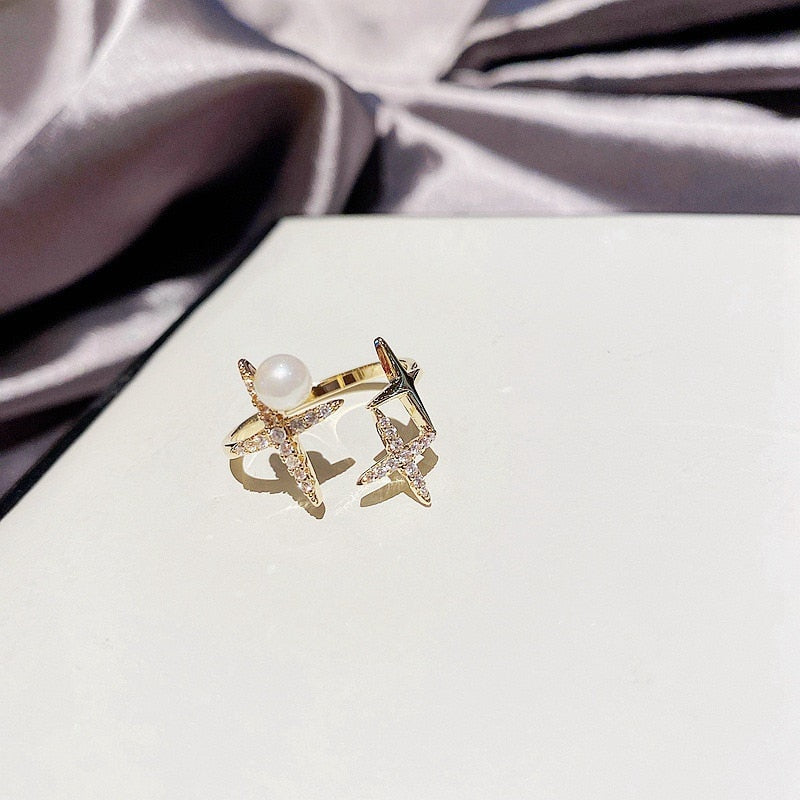 Adjustable golden pearl star ring