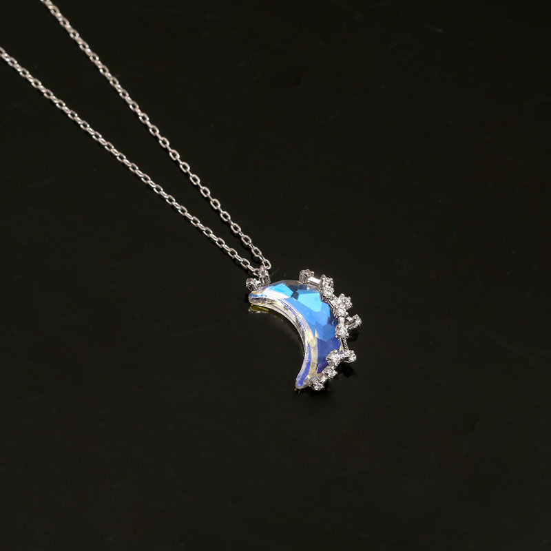 Luminous half-moon pendant