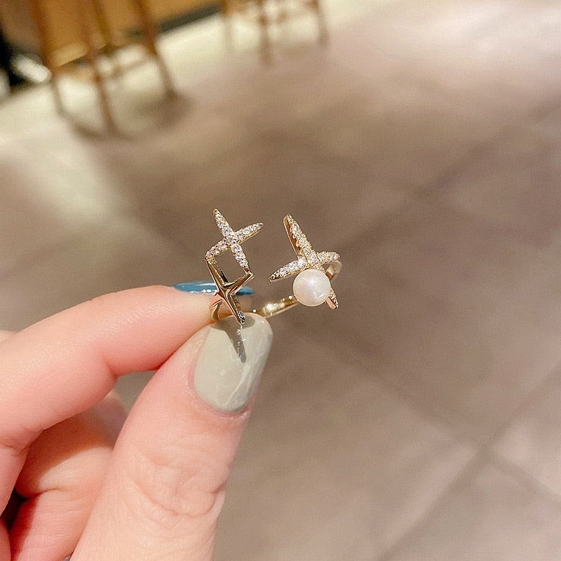 Adjustable golden pearl star ring