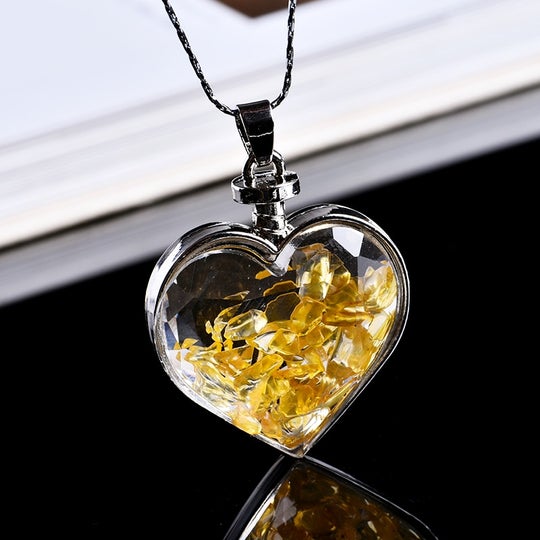 Natural crystal heart pendant