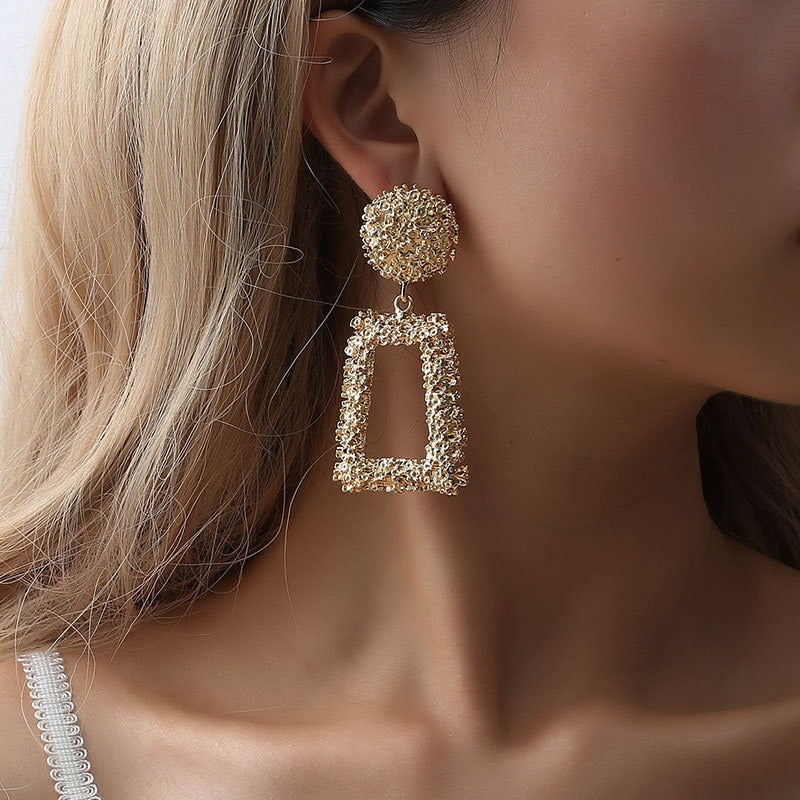Modernist style plated earrings