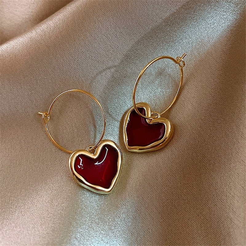 Small red heart earrings