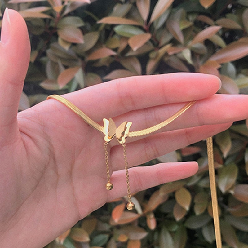 Golden butterfly pendant