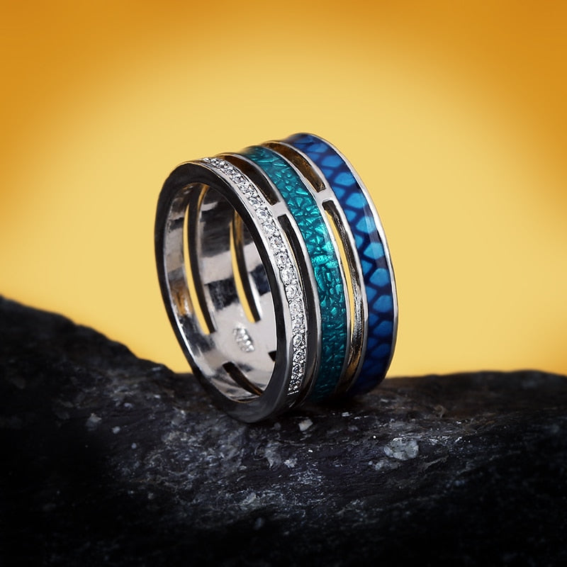 Multicolored blue round geometric ring