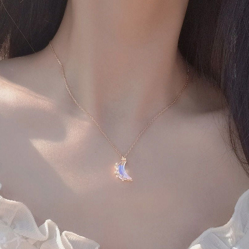 Luminous half-moon pendant
