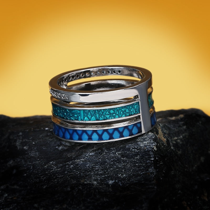 Multicolored blue round geometric ring