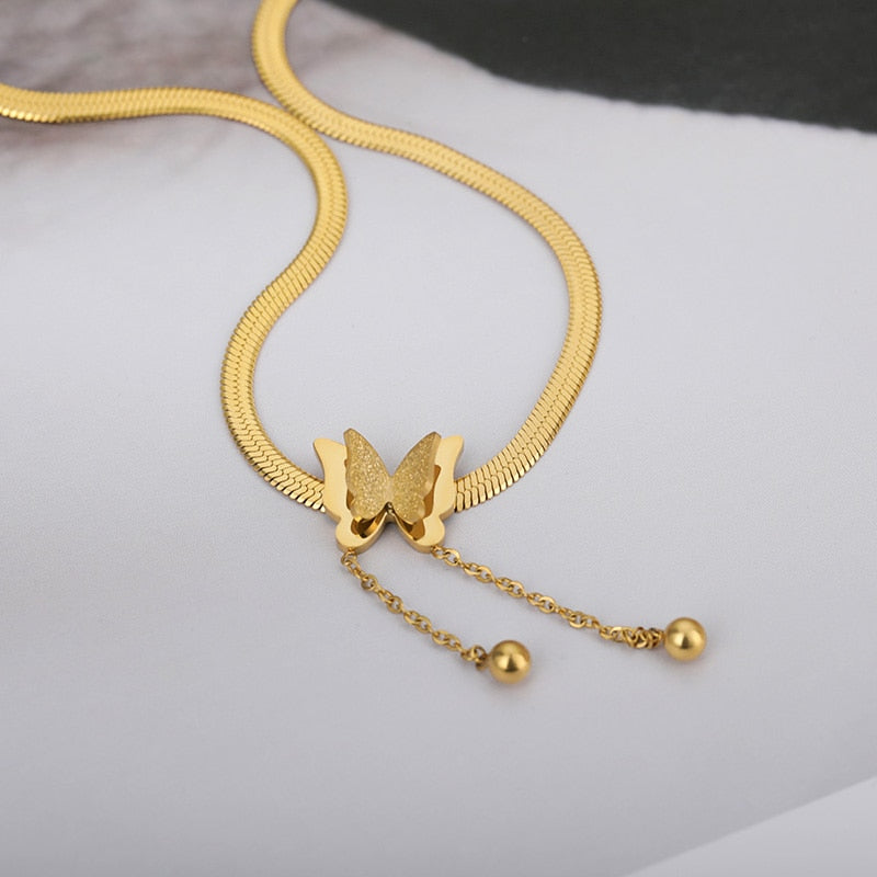 Golden butterfly pendant