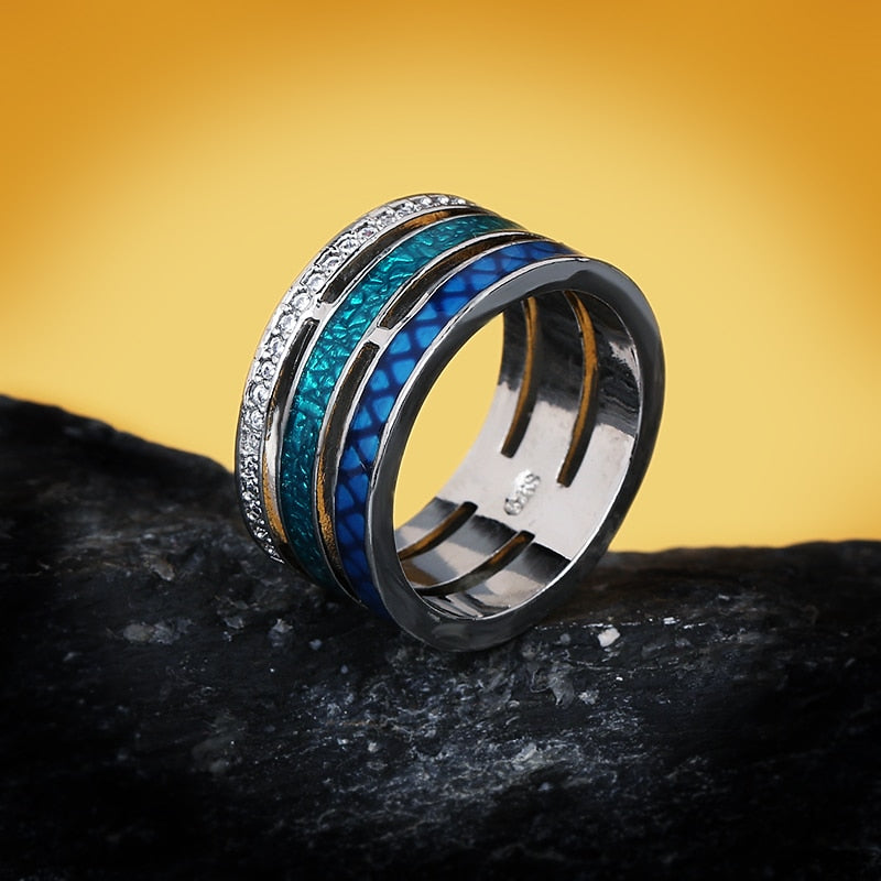 Multicolored blue round geometric ring
