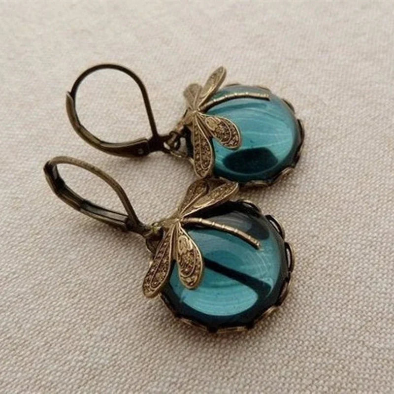 Dragonfly earrings with antique blue crystal