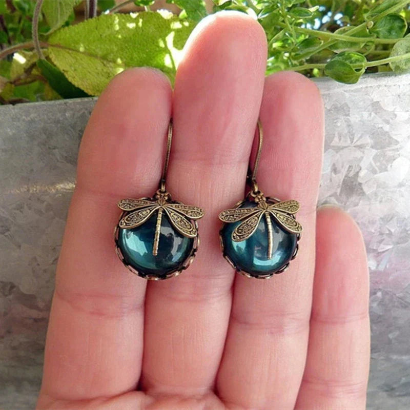 Dragonfly earrings with antique blue crystal