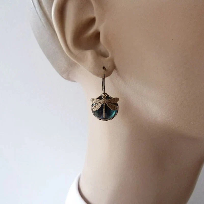 Dragonfly earrings with antique blue crystal