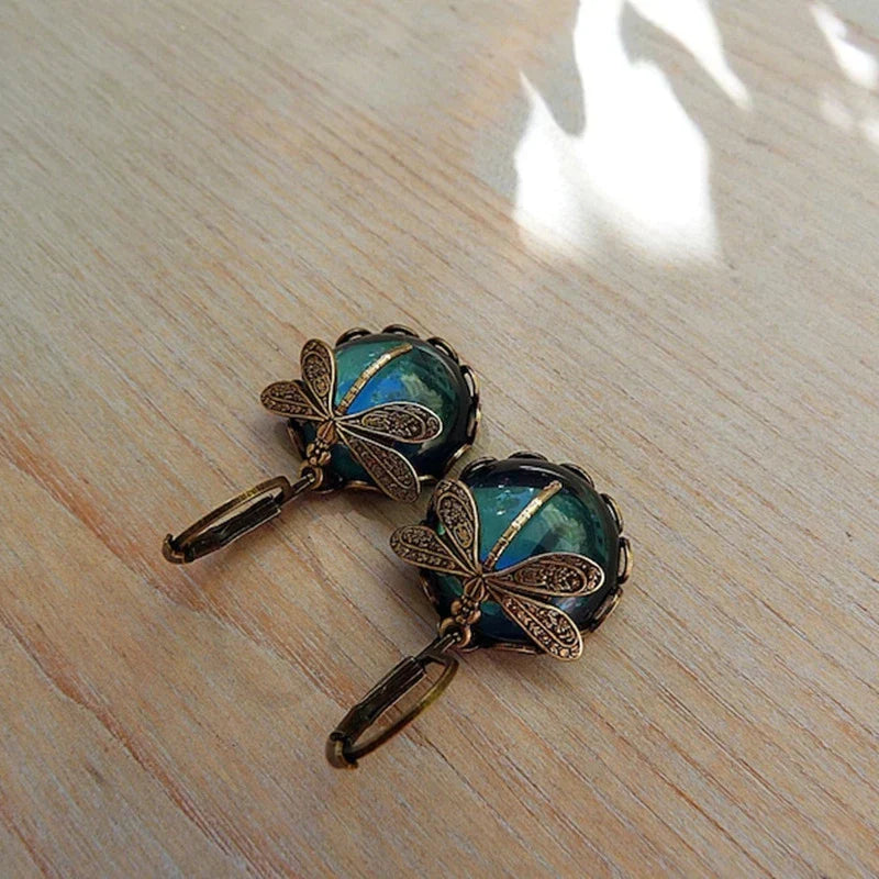 Dragonfly earrings with antique blue crystal