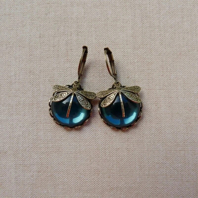 Dragonfly earrings with antique blue crystal