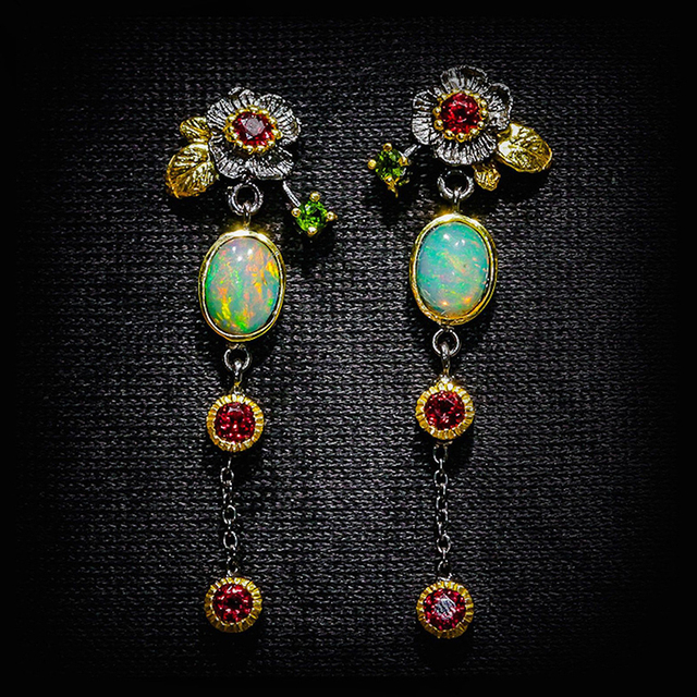 Earrings with blue opal and red crystals