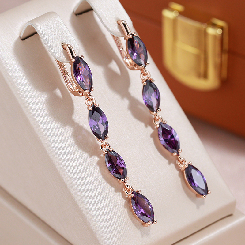 Elegant dangling earrings with purple zirconia