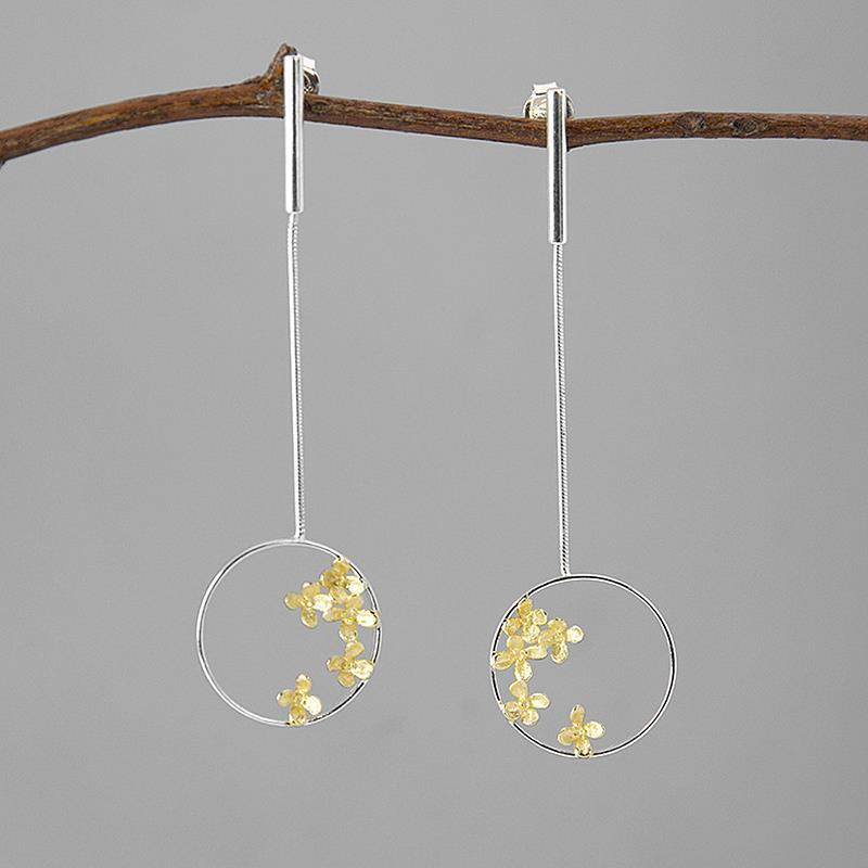 Silver flower dangle earrings