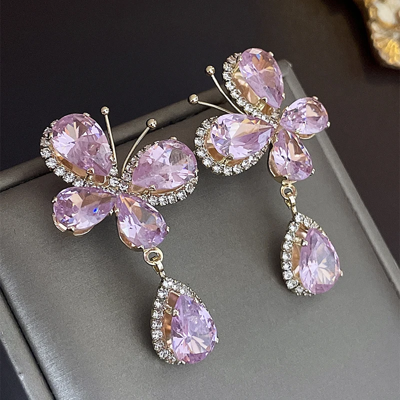 Elegant pink daisy dangle earrings