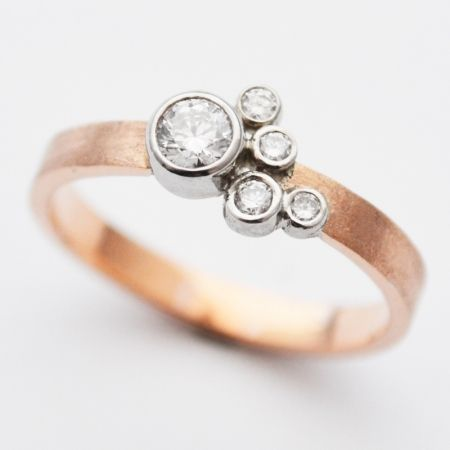 Pink ring with zircons