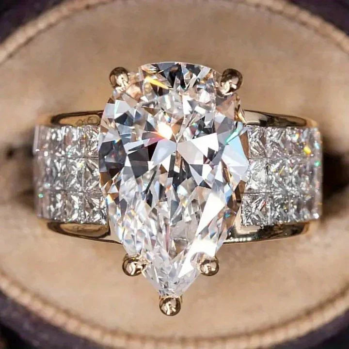 Ring with a shiny crystal drop