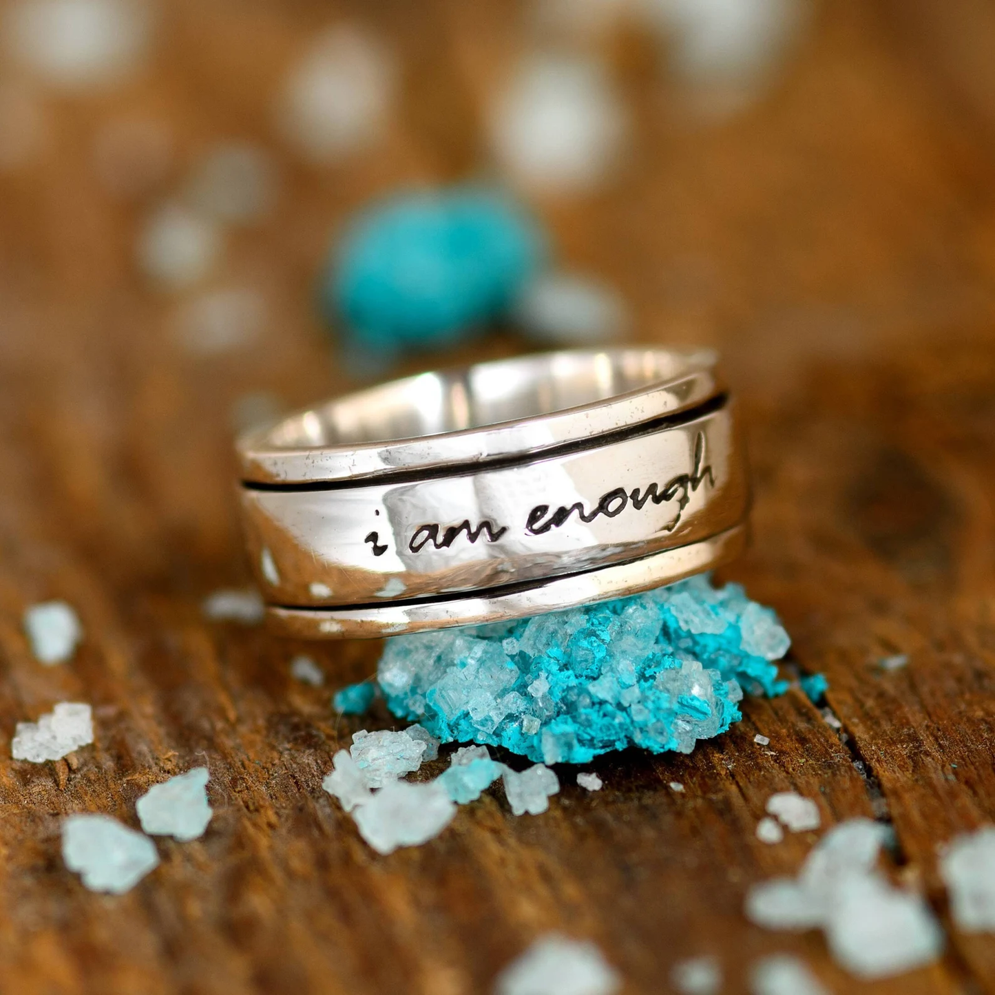 Ring with motivational symbol