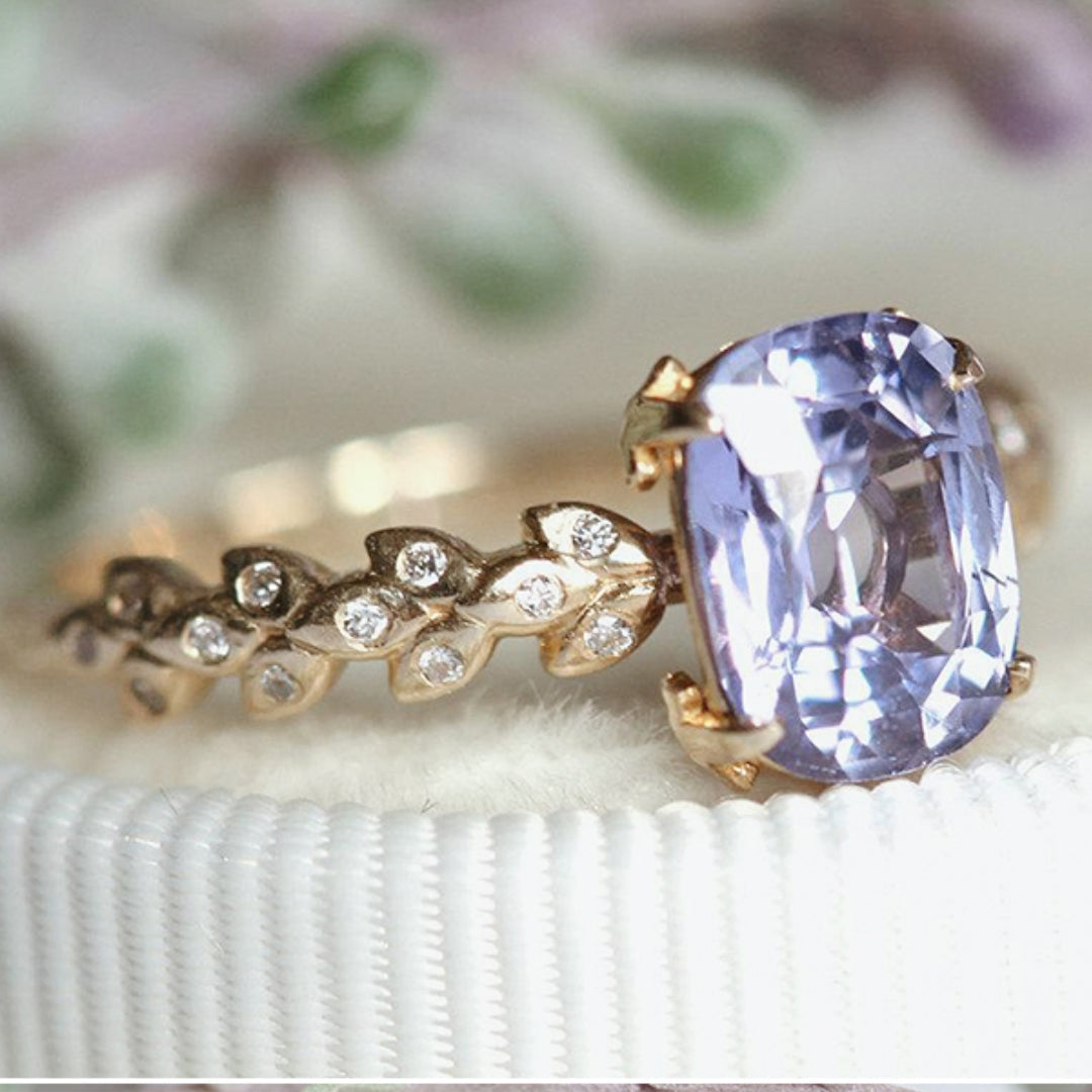 Purple rounded crystal ring
