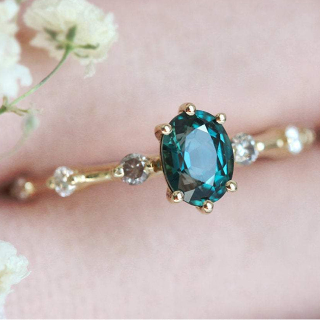 Green rounded crystal ring