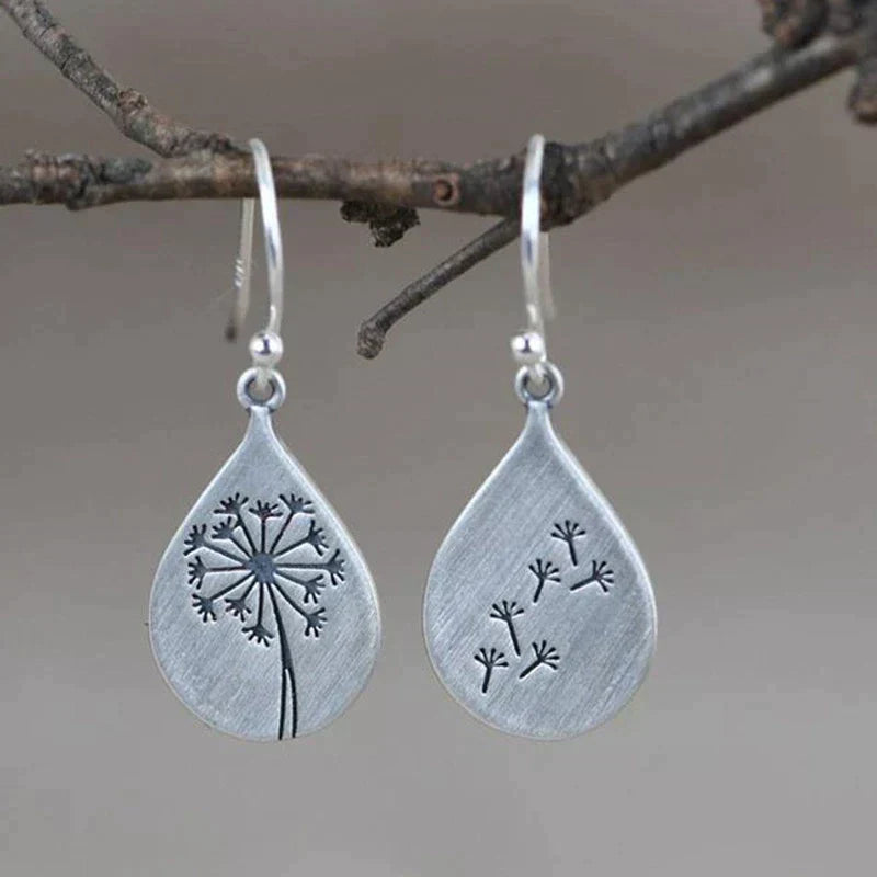 Silver dandelion dangle earrings