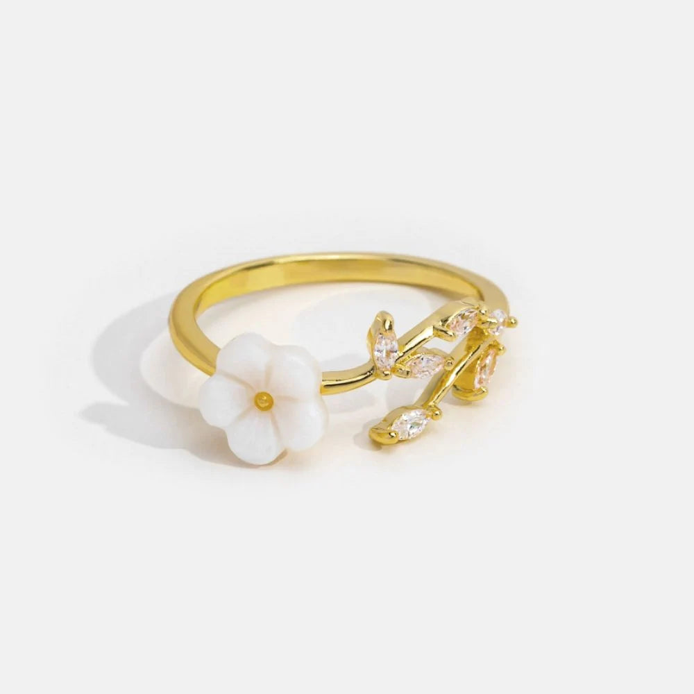 Adjustable white petal ring with zircons