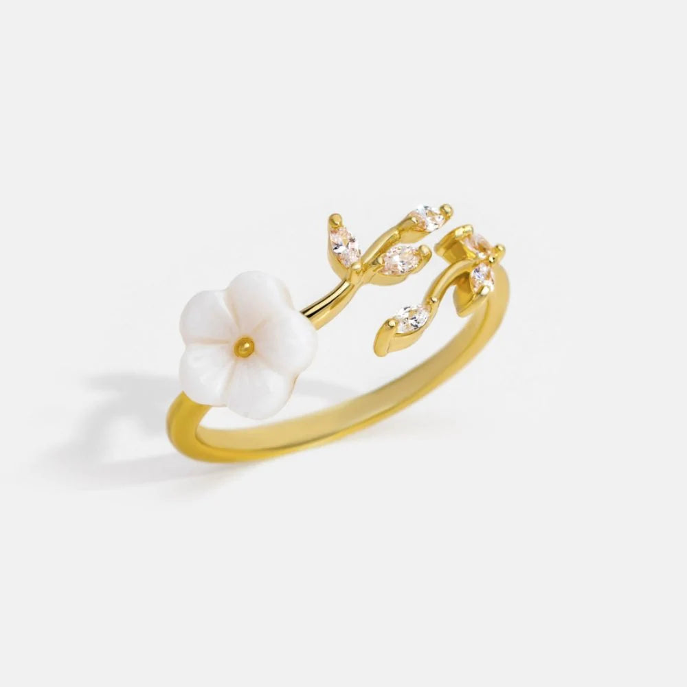 Adjustable white petal ring with zircons