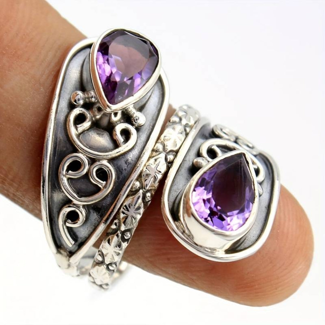 Ring with purple crystal