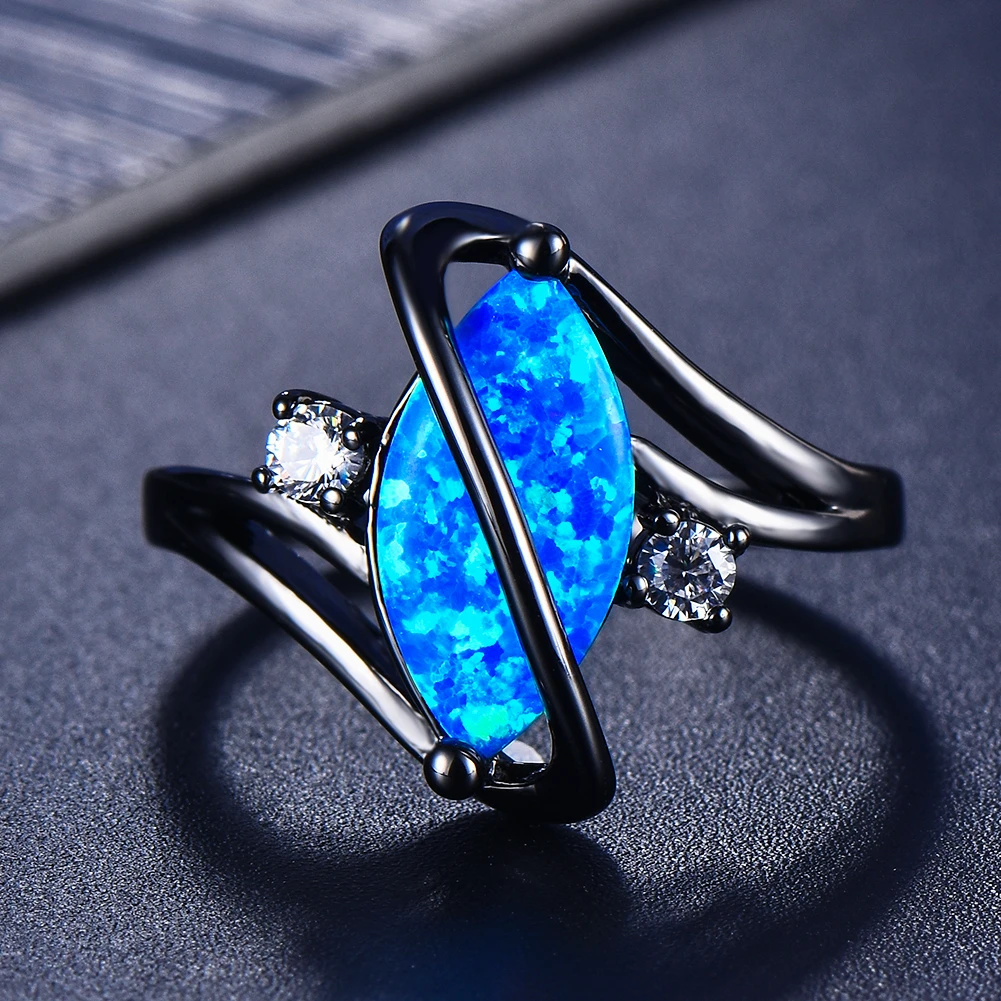 Dark ring with blue opal