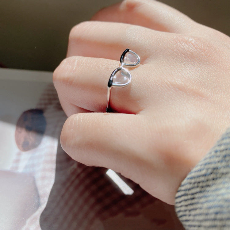 Adjustable ring with minimalist style lenses