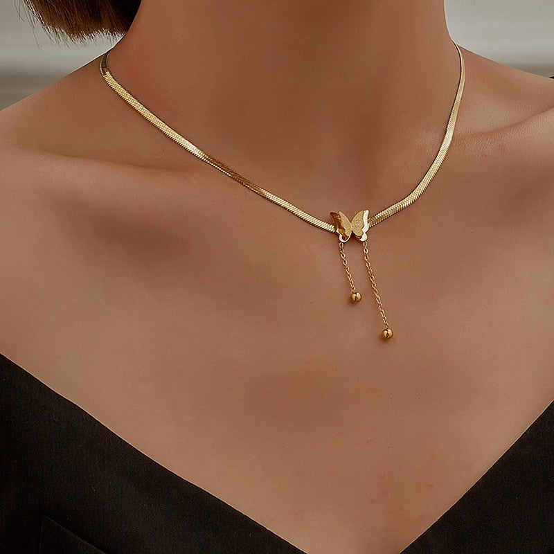 Golden butterfly pendant
