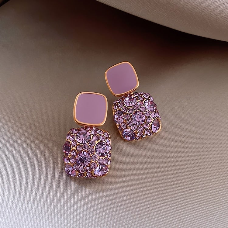 Luxury purple earrings with inlaid zircons