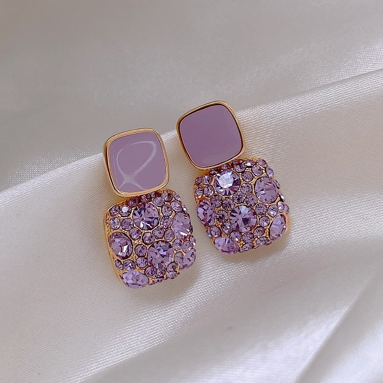 Luxury purple earrings with inlaid zircons