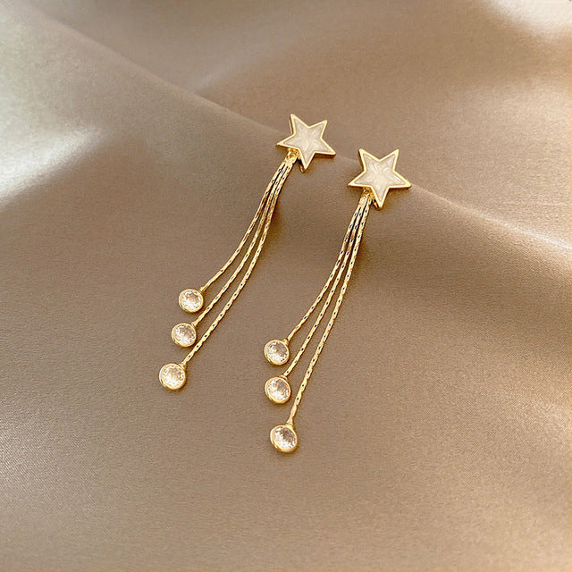 Gold-plated crystal star dangle earrings