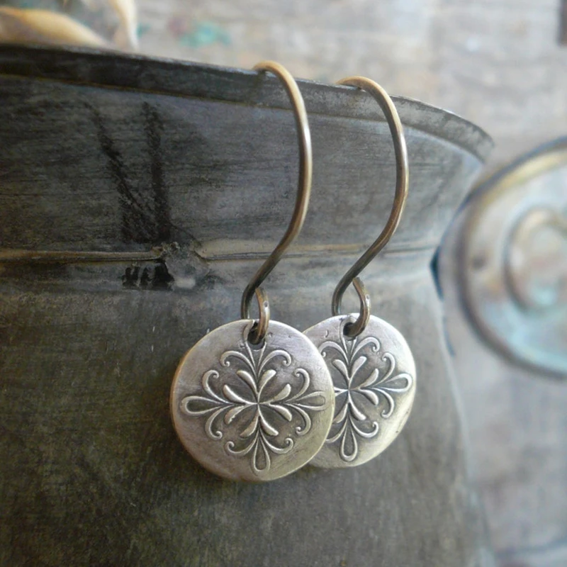 Round silver earrings
