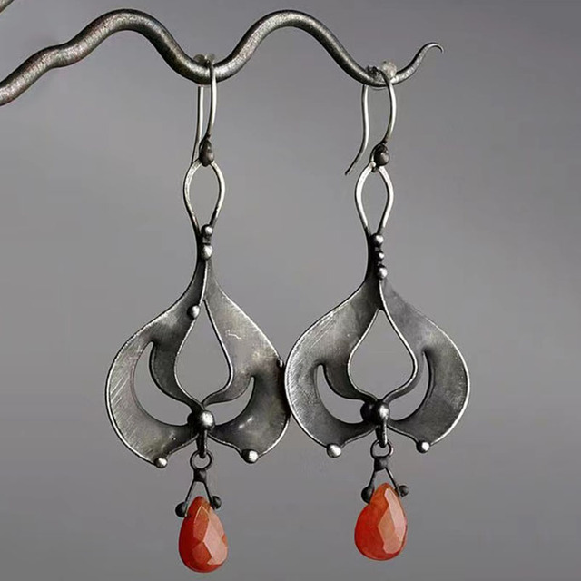 Orange stone dangling earrings