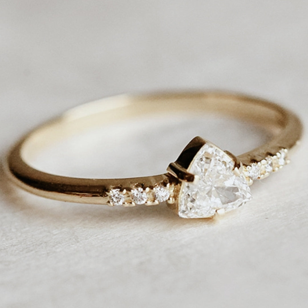 Ring with white heart crystal